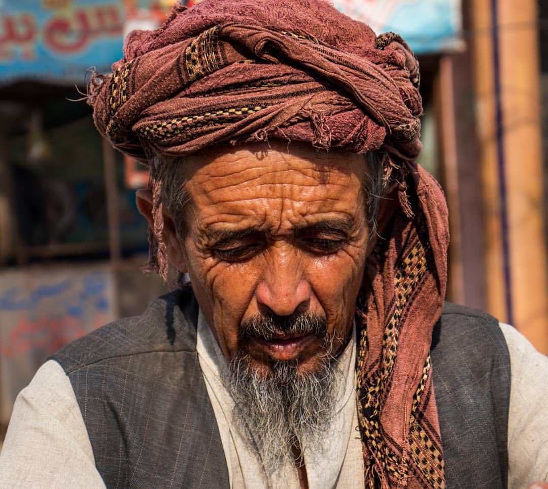 photo of a man looking down