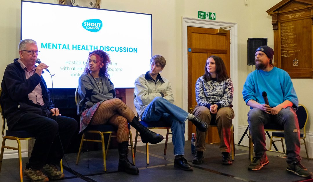 a panel of 5 people discussing mental health