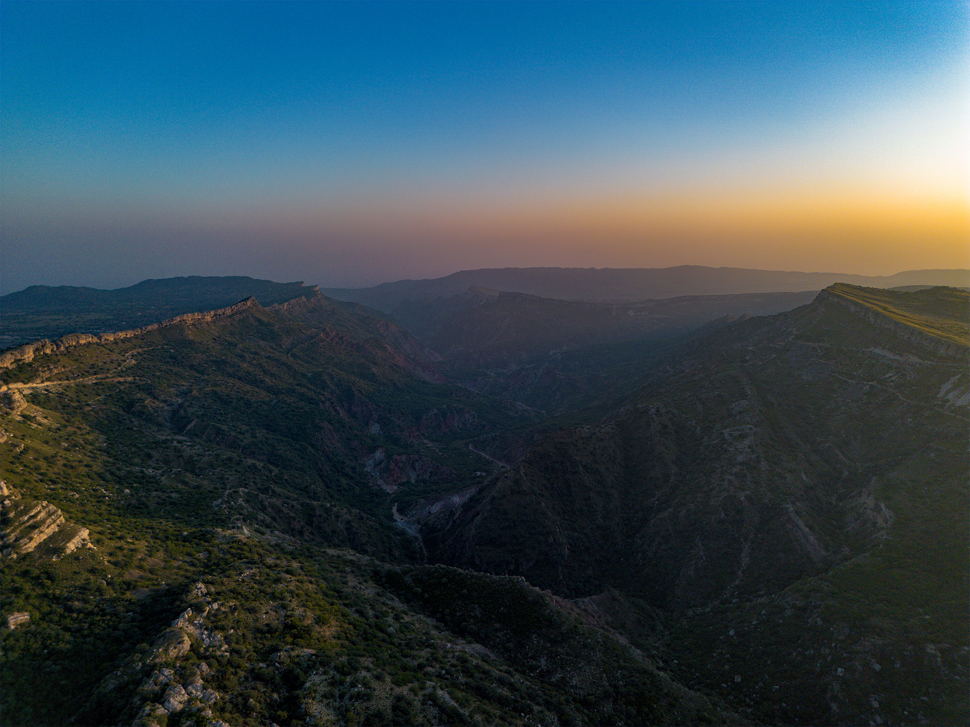 a twilight sky over mountains