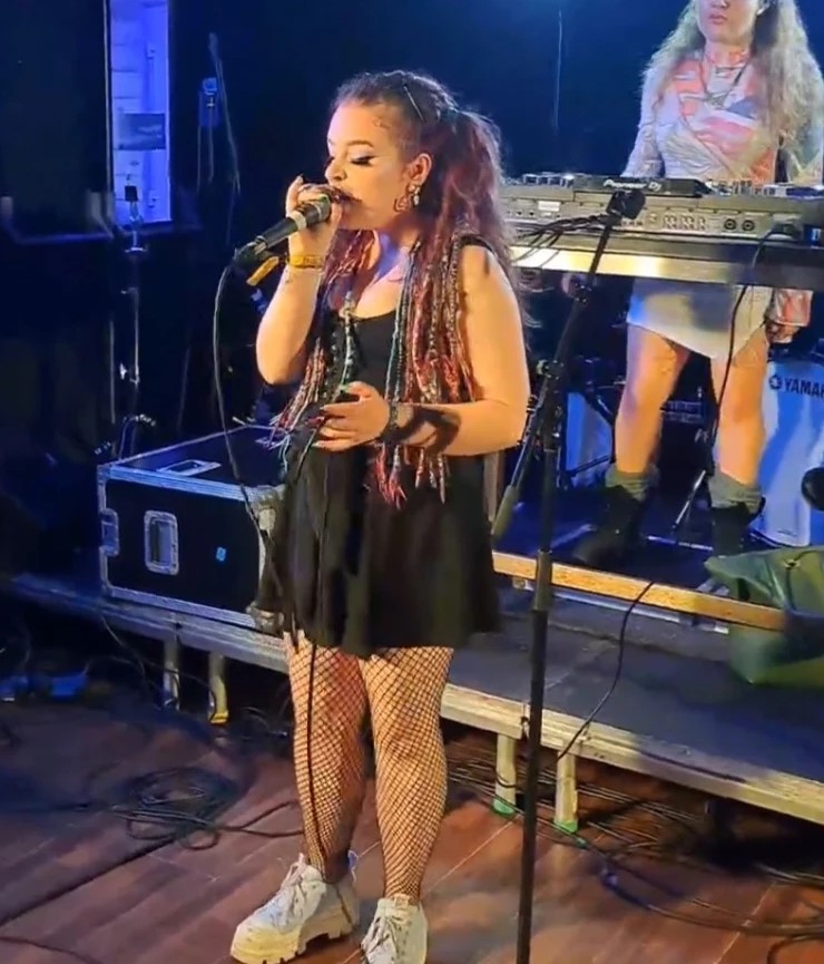 Rhi'N'B performing on stage