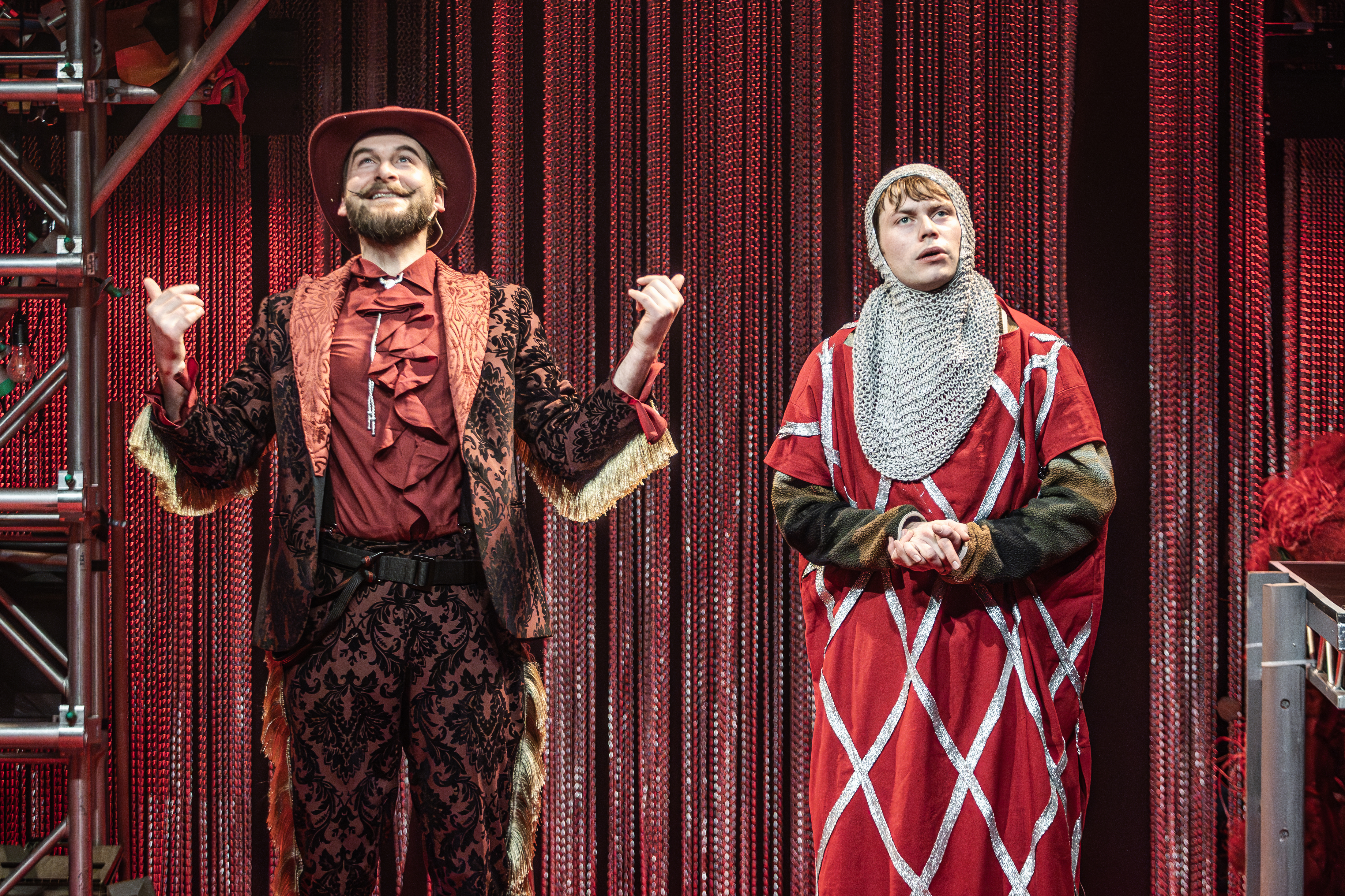 Tom on stage performing in medieval costume