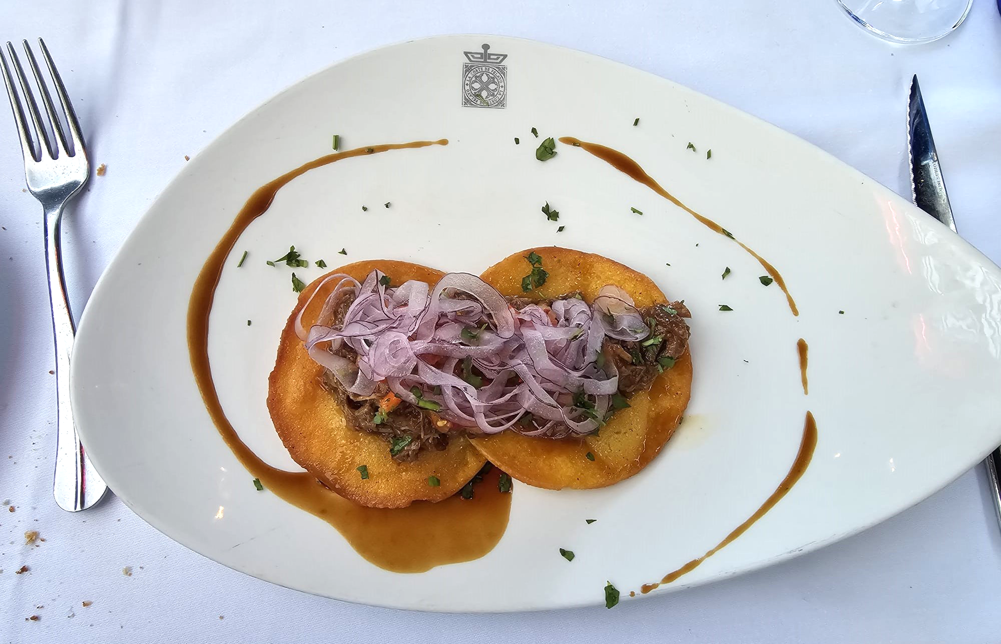 Tortos with meat and onion