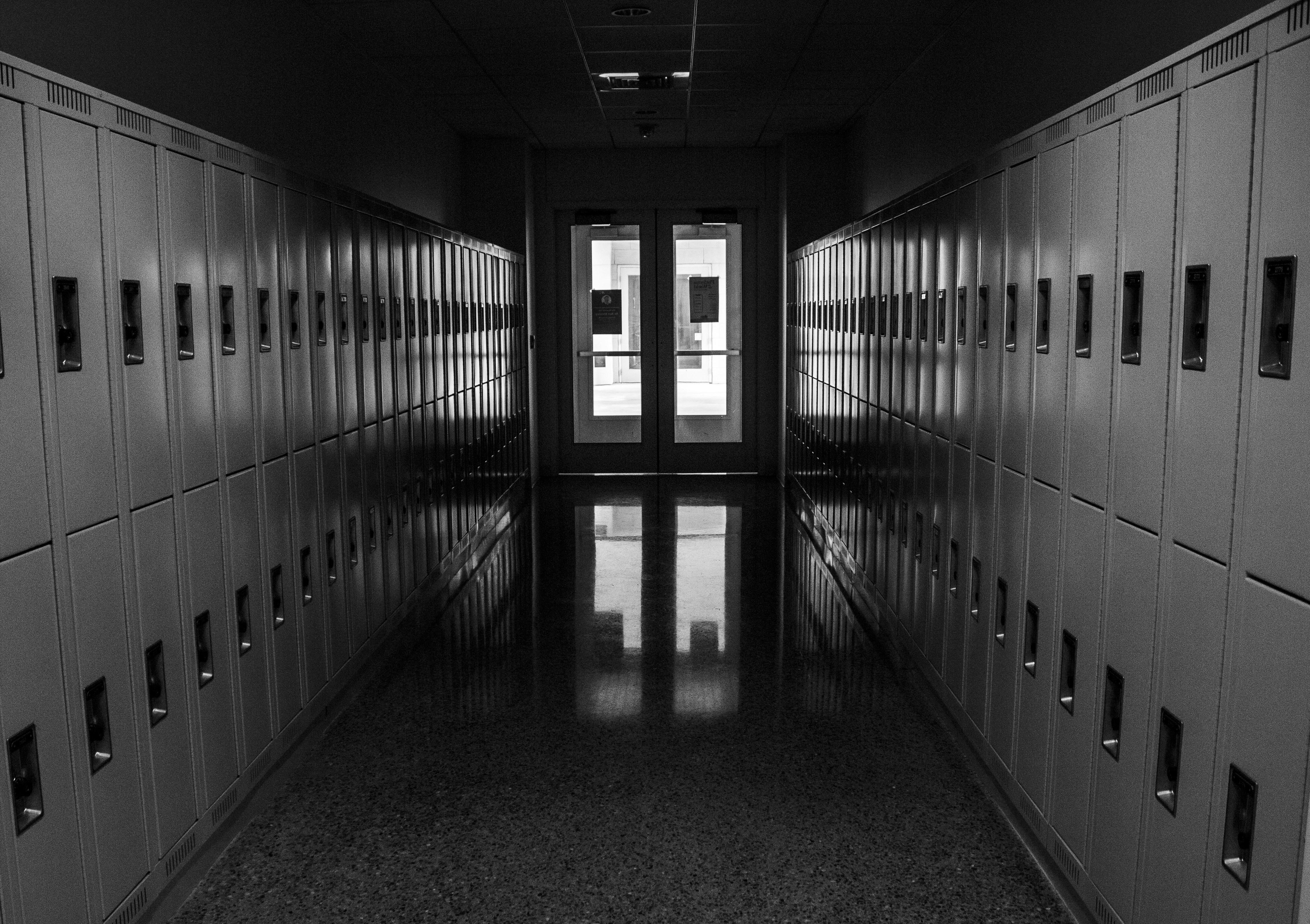lockers in a dark hallway