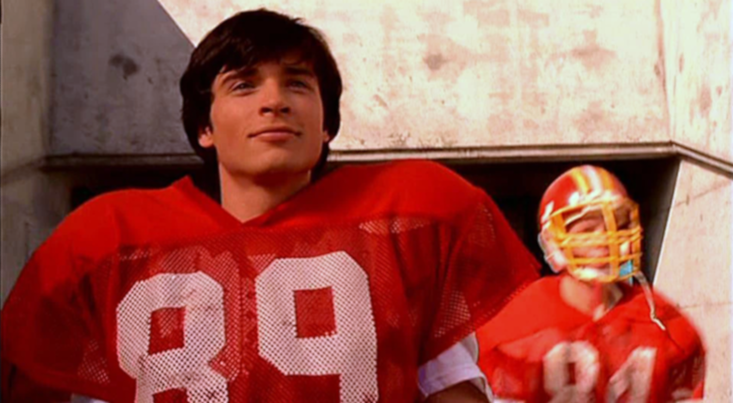 clark kent in a red football uniform