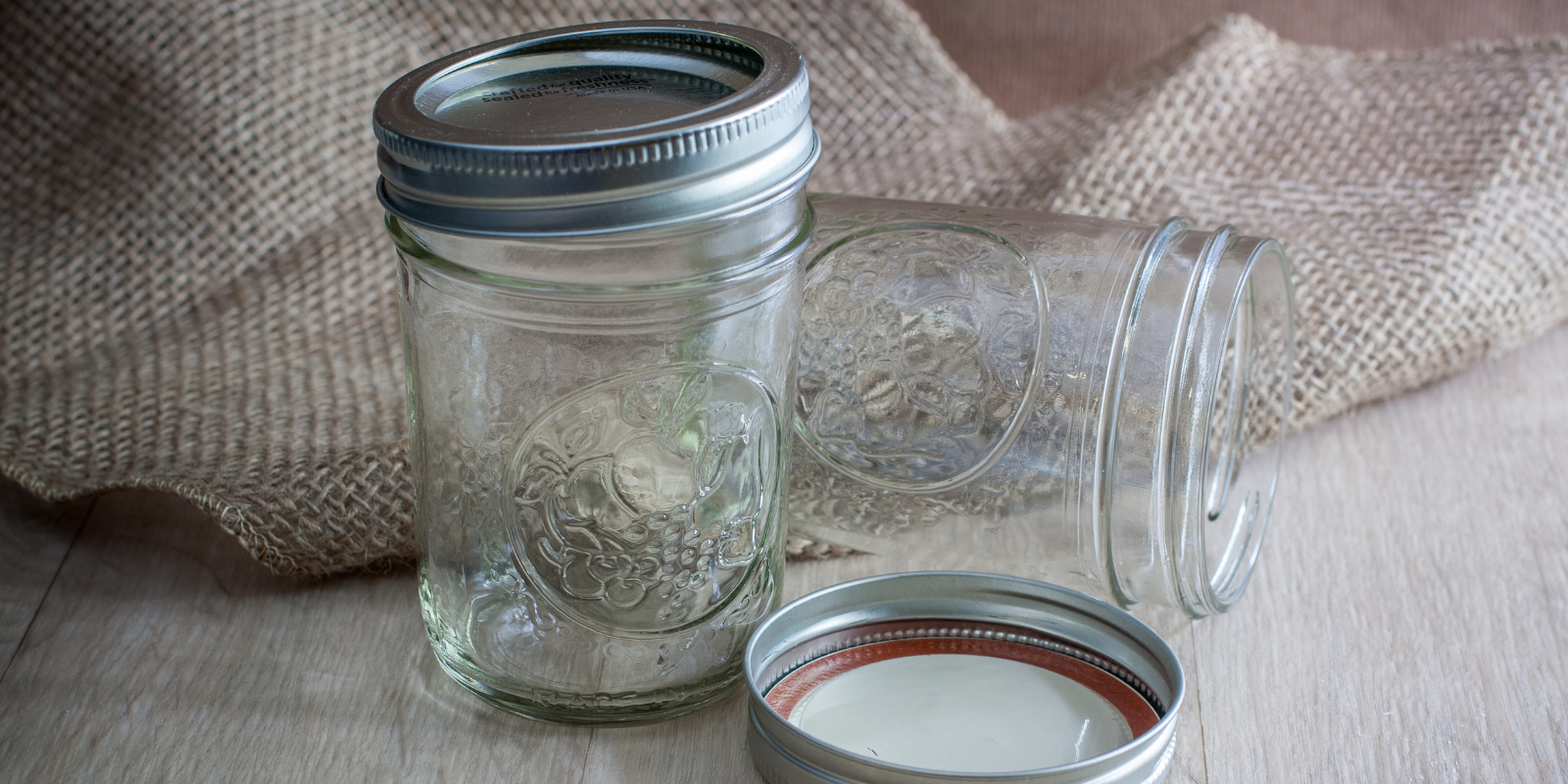 canning jars sitting on a table
