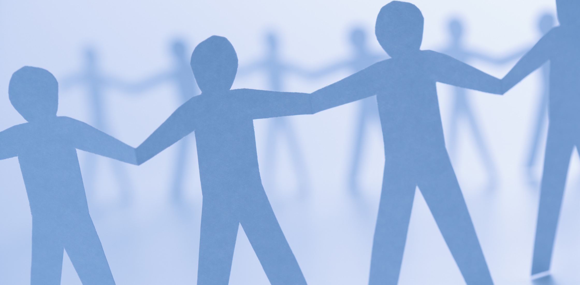 blue paper dolls holding hands