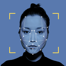 Woman's face with scan points overlaid on a blue background