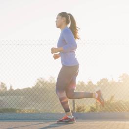 woman running on the pavement