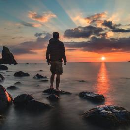 person watching the sunset