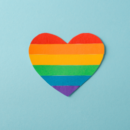 pride heart on a blue background
