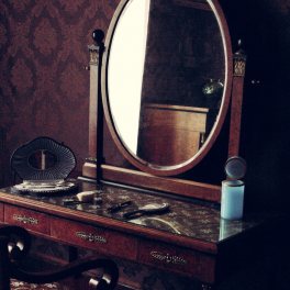 vintage vanity with a mirror