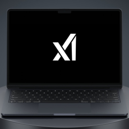 the X Ai logo on a black laptop 