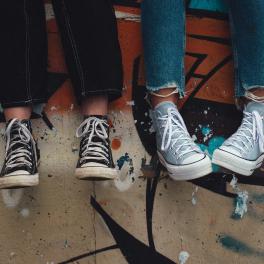 teenagers wearing converse