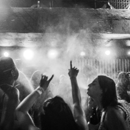 black and white photo of people in a night club