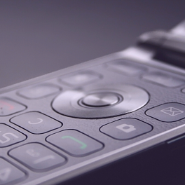 a close up photo of a flip phone keypad