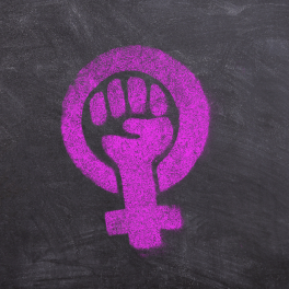 A pink feminist symbol on a gray background