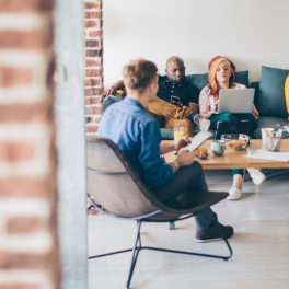 roommates sitting on a couch