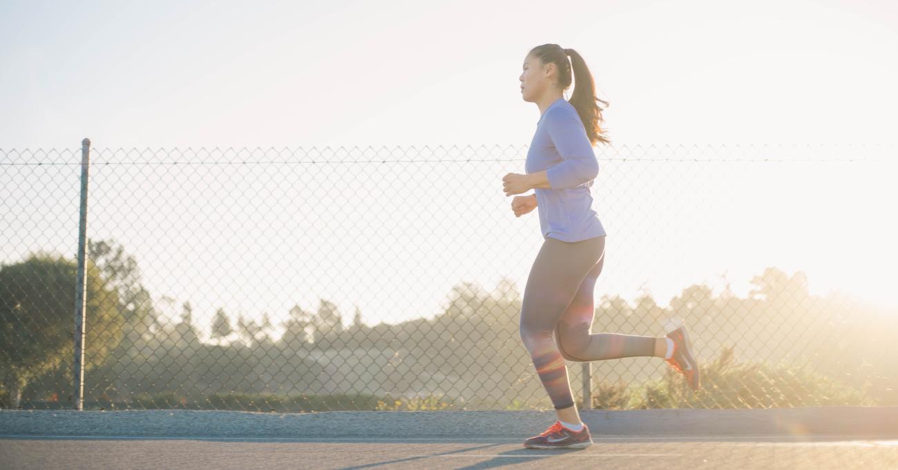 woman running on the pavement