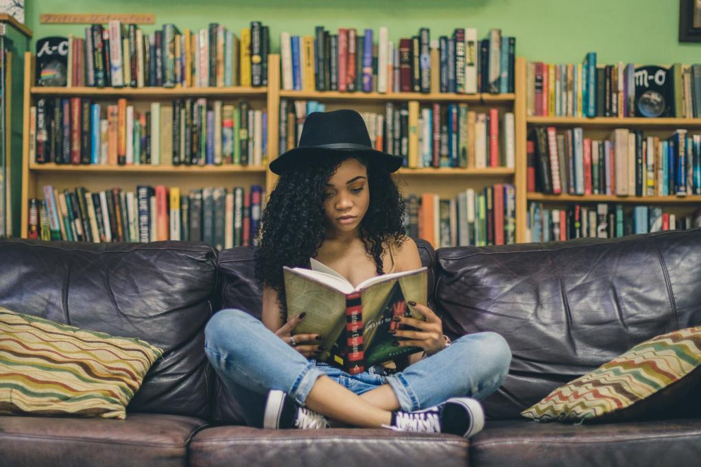 woman reading on the couch