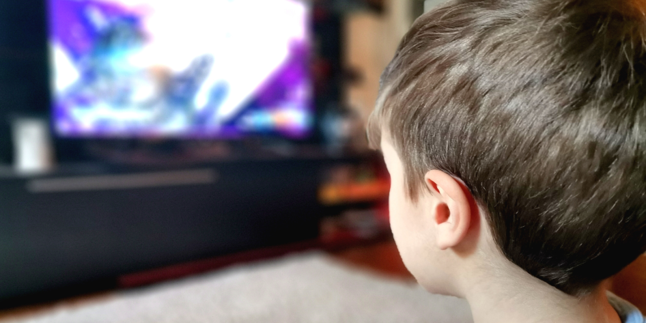 young boy watching tv