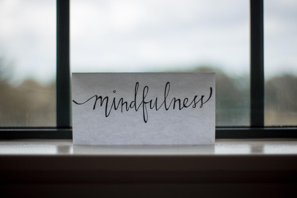 "mindfulness" written on a piece of paper