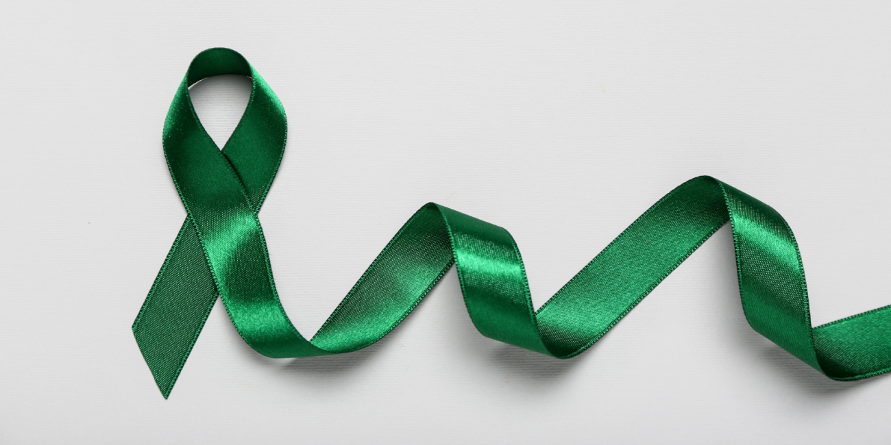 Green ribbon on a white background