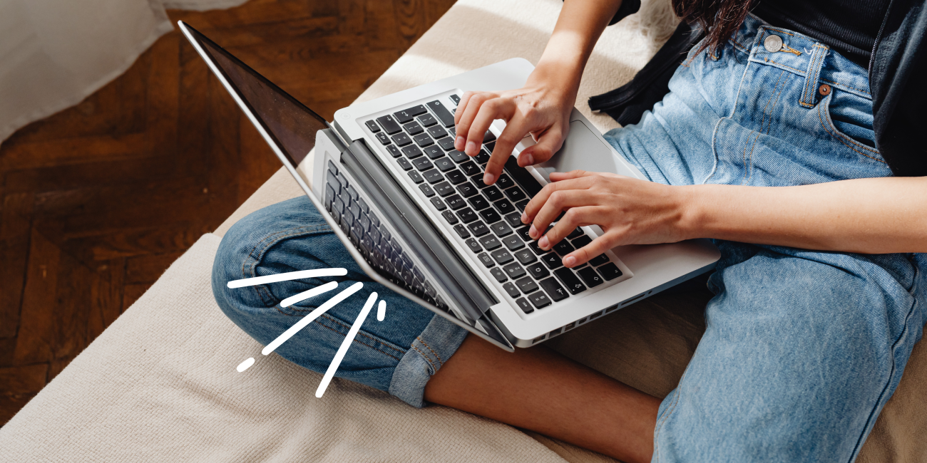 person typing on a laptop