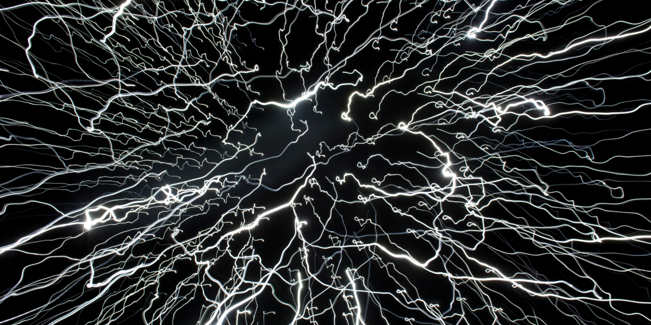 white glowing streaks on a black background