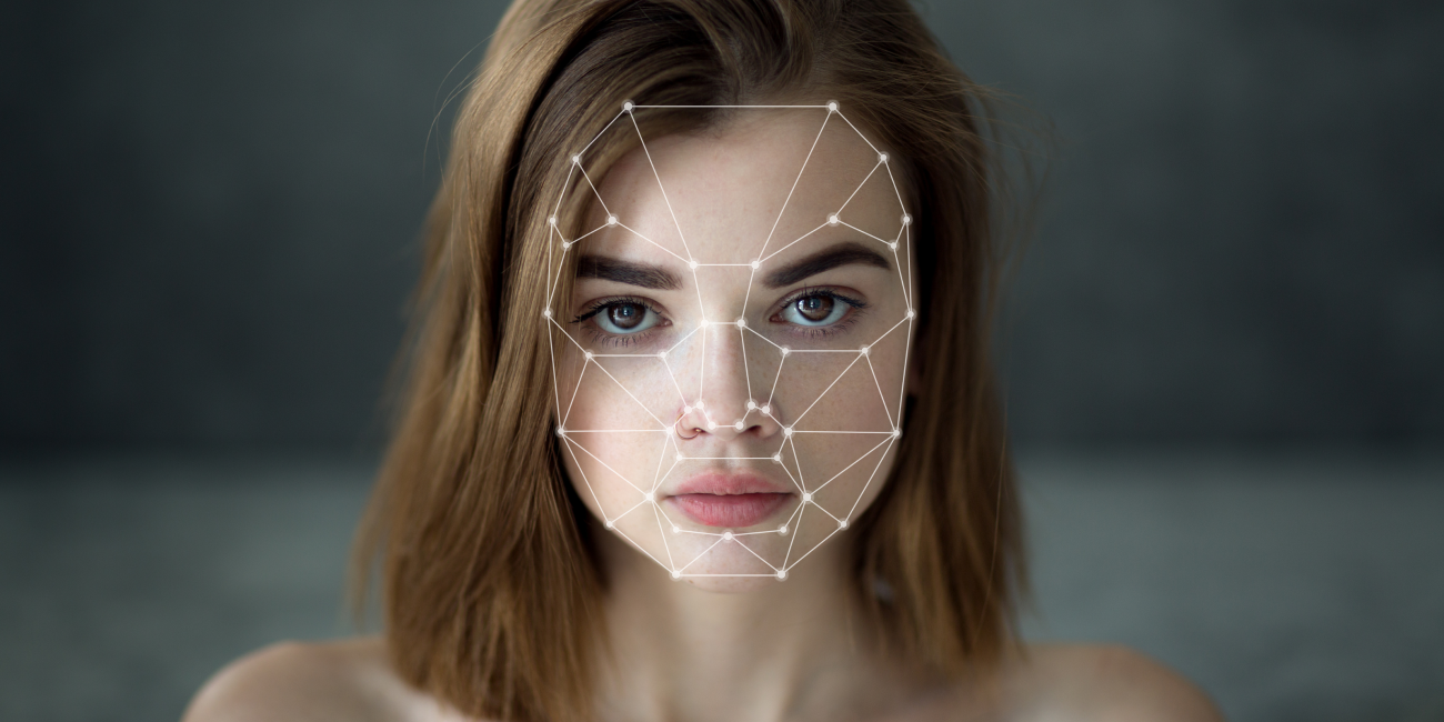 Woman with Biometric face detection dots and lines on her face
