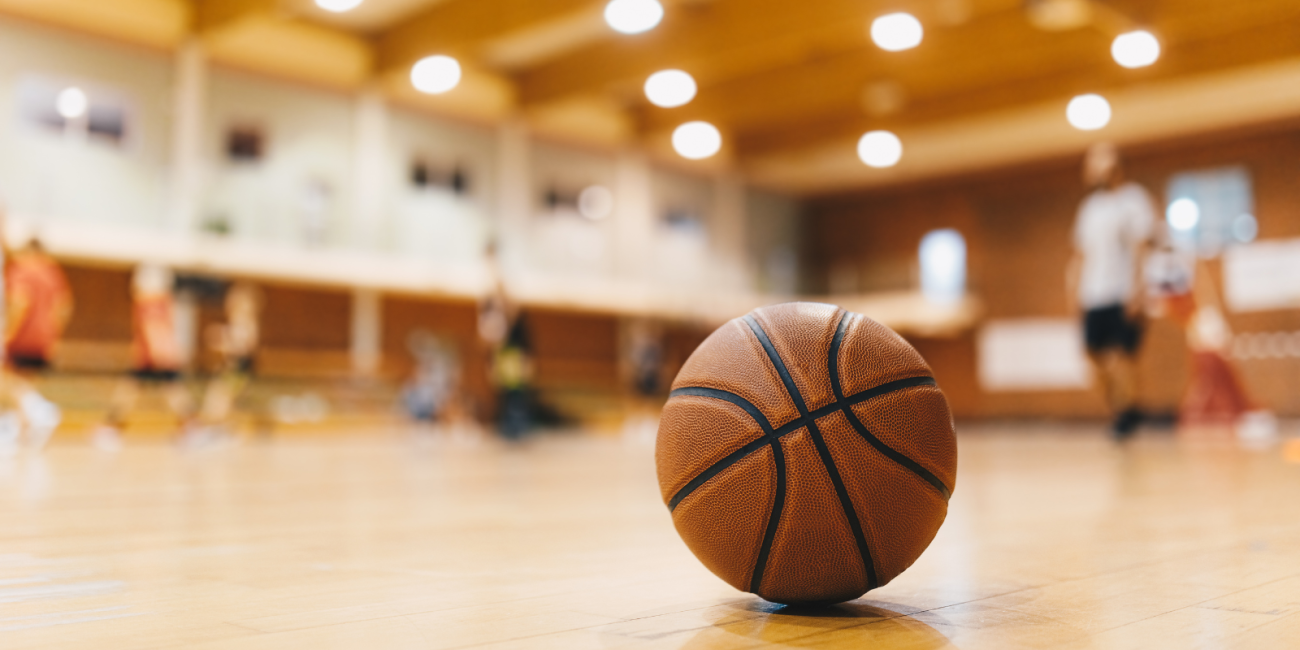 a basketball sitting on a court