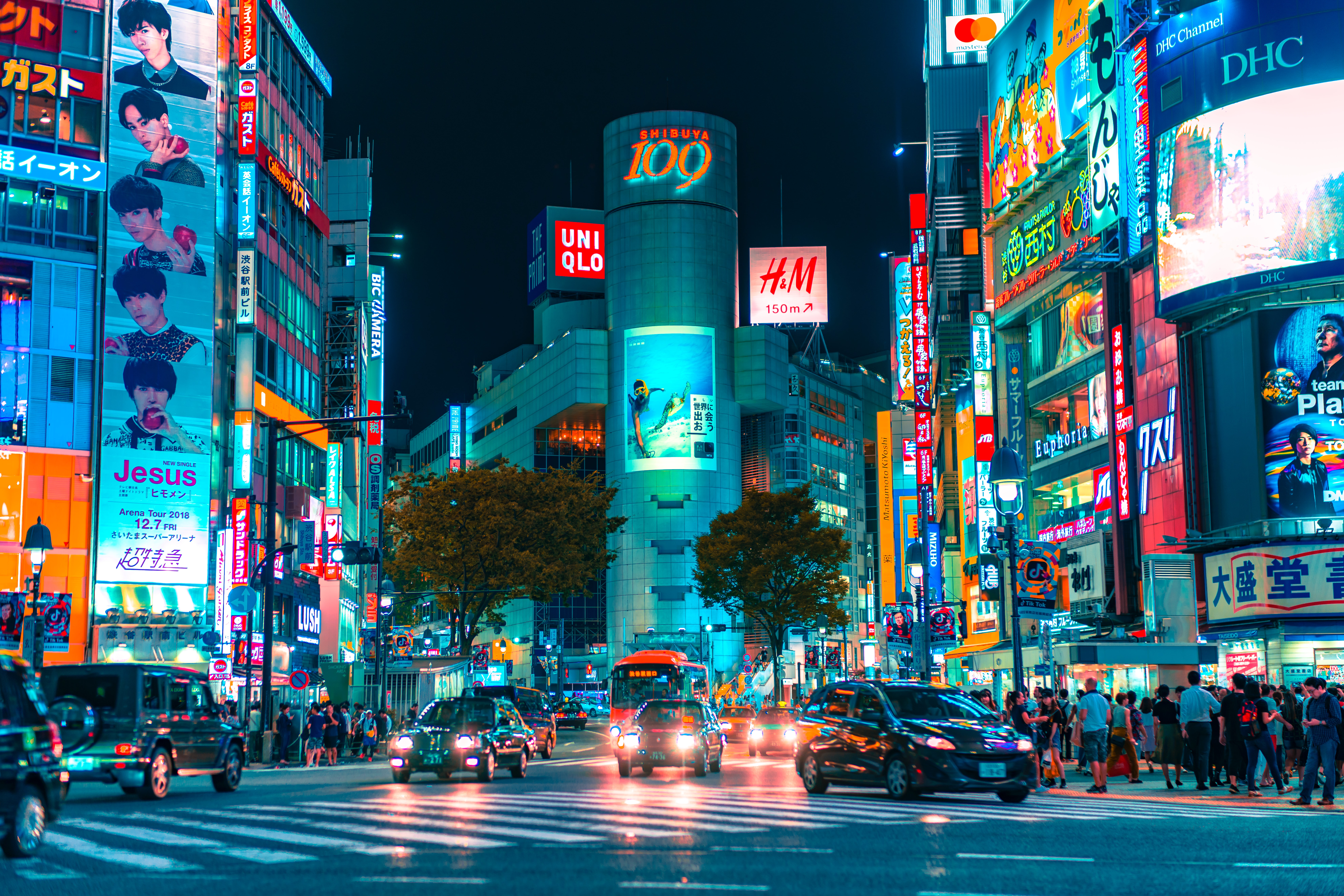 Busy street in japan with many neon signs